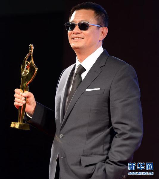 9月27日，導(dǎo)演王家衛(wèi)出席媒體見面會，其作品《一代宗師》獲得最佳影片獎。 當(dāng)日，第32屆大眾電影百花獎頒獎儀式在蘭州舉行。 新華社記者聶建江 攝