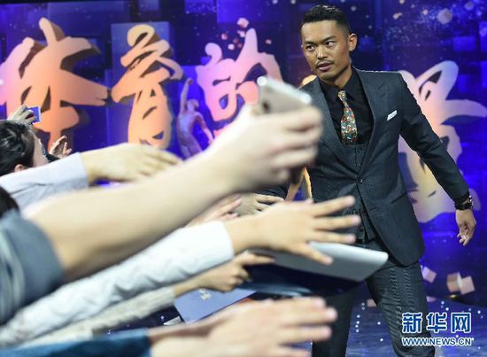 2月1日，羽毛球國手林丹在頒獎典禮紅毯儀式上。 當日，“2014CCTV體壇風云人物年度評選”頒獎典禮在京舉行。 新華社記者公磊1