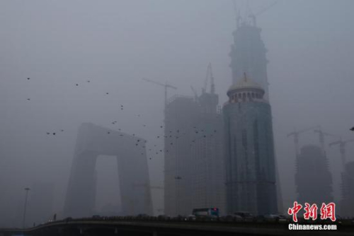 資料圖：遭遇霧霾襲擊的北京。<a target='_blank' href='http://www.chinanews.com/'>中新社</a>記者 李慧思 攝