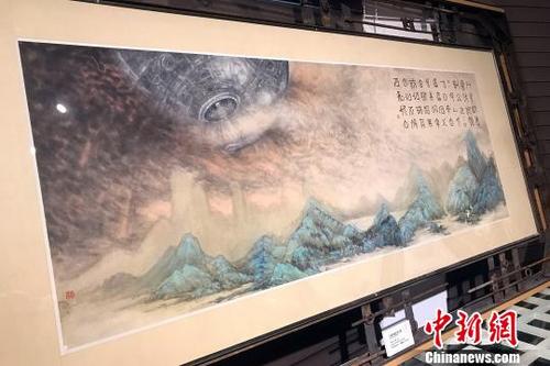 中國(guó)僑網(wǎng)水墨畫《行星軌道邊防記載》?！⊥躞?攝