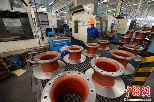 資料圖：正在工作的工人。<a target='_blank' href='http://www.chinanews.com/'>中新社</a>記者 王東明 攝 