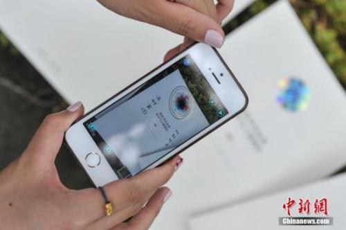 資料圖。越來越多的用戶用手機拍照。<a target='_blank' href='http://www.chinanews.com/'>中新社</a>記者 任東 攝
