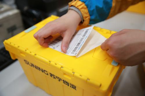 可循環(huán)利用的包裝箱。來源：蘇寧供圖