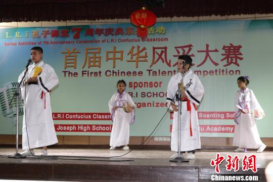 中國僑網(wǎng)圖為比賽現(xiàn)場?！埑恳怼z