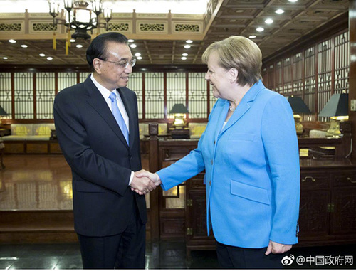 李克強(qiáng)歡迎默克爾訪華 就中德中歐關(guān)系交換意見