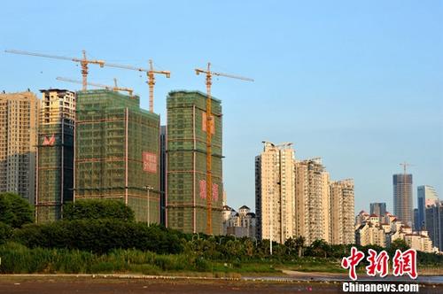 資料圖：正在建設(shè)中的房地產(chǎn)樓盤(pán)。<a target='_blank' href='http://www.chinanews.com/'>中新社</a>記者 張斌 攝