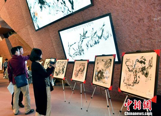 活動現(xiàn)場?！“苍?攝