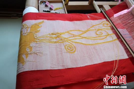 緯線約14萬根，寓意14億中華兒女同心共筑中國夢 遂昌提供 攝