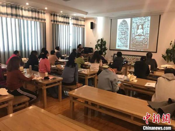 圖為“莫高學堂”活動現(xiàn)場。(資料圖) 敦煌研究院供圖 攝