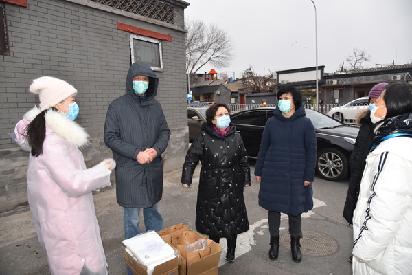 1民革市委主委王紅參與社區(qū)防控