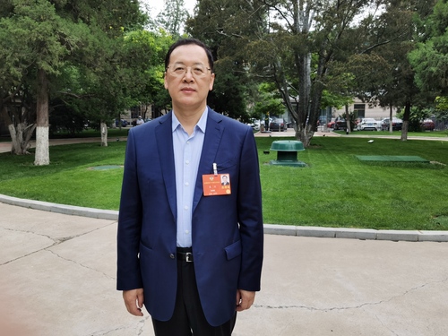 全國政協(xié)委員龐達(dá)