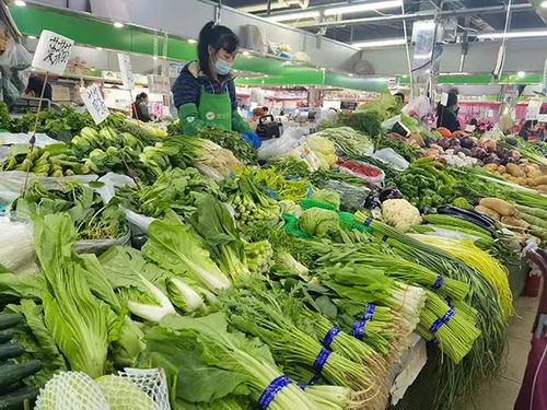 圖說(shuō)：北京某菜市場(chǎng)蔬菜供應(yīng)充足。